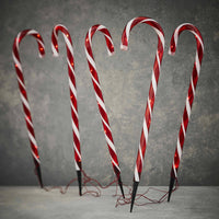 Zuckerstangen Gartenstecker, perfekt für eine süße Atmosphäre. 